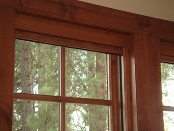 Retractable wood window screen